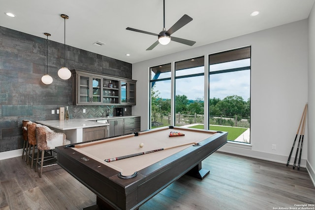 rec room with dark hardwood / wood-style flooring, ceiling fan, and billiards