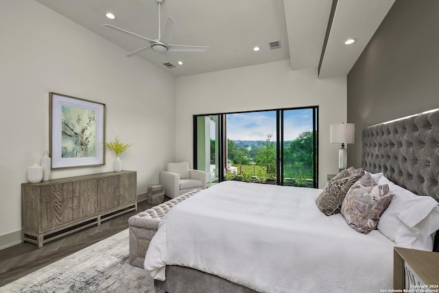 bedroom featuring access to exterior, ceiling fan, and dark hardwood / wood-style floors