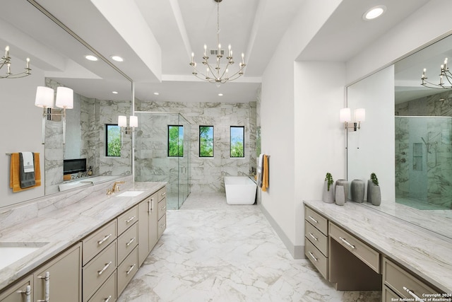 bathroom featuring vanity, an enclosed shower, and an inviting chandelier