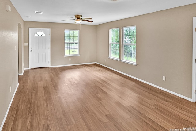 interior space featuring light hardwood / wood-style floors, plenty of natural light, and ceiling fan