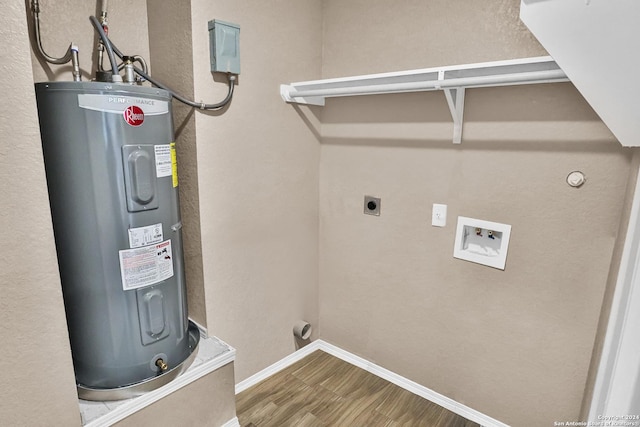 utility room featuring electric water heater