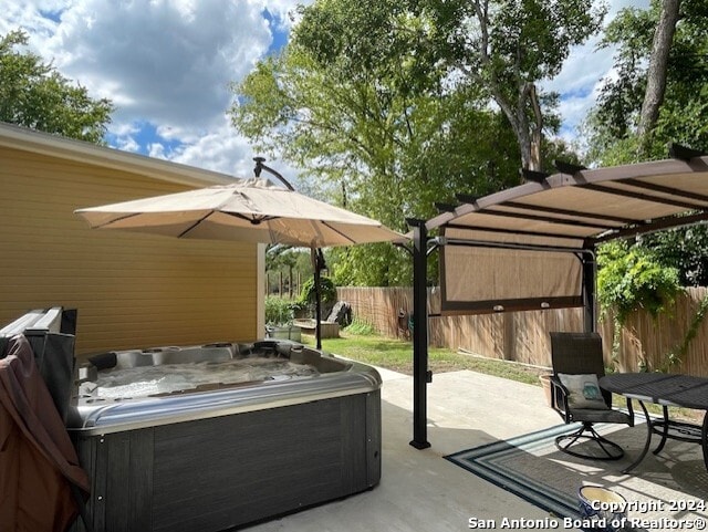 view of patio featuring a hot tub