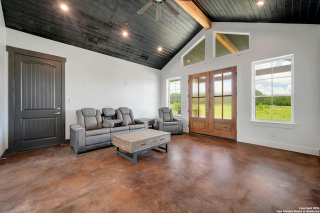 living room featuring beamed ceiling, a wealth of natural light, french doors, and high vaulted ceiling