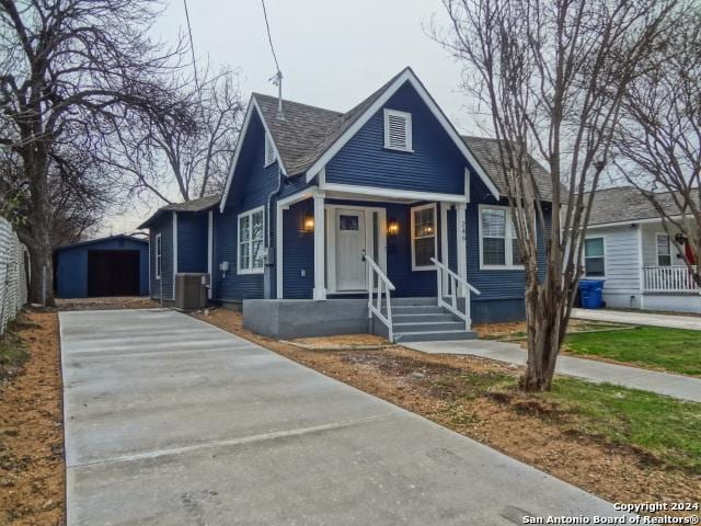 bungalow-style house featuring central AC