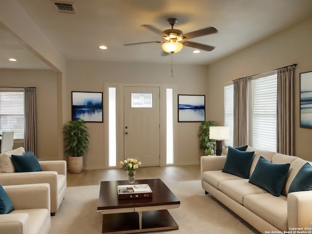 living room featuring ceiling fan