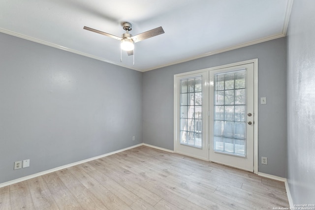 8655 Datapoint Dr Unit 212, San Antonio, TX 78229 - empty room featuring ceiling fan, baseboards, crown molding, and wood finished floors