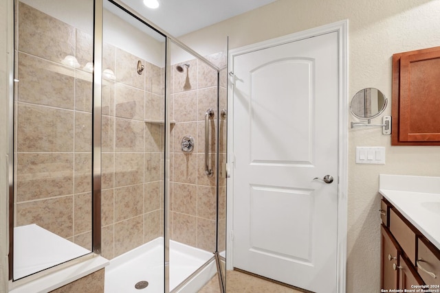 bathroom featuring vanity and walk in shower