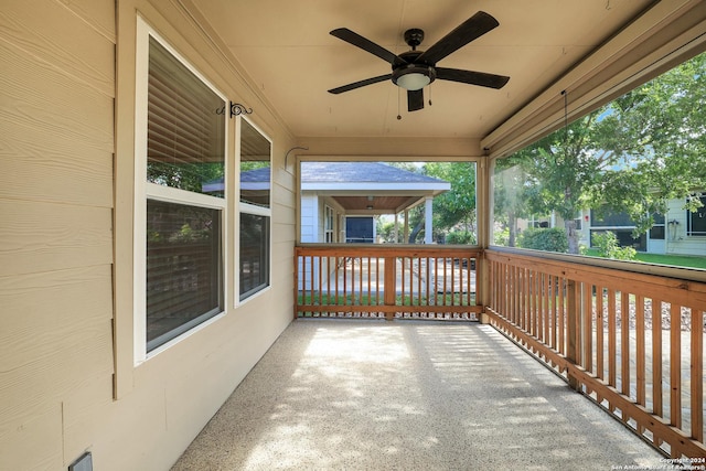 view of patio / terrace with ceiling fan and a porch