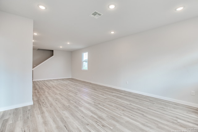 unfurnished room featuring light hardwood / wood-style flooring