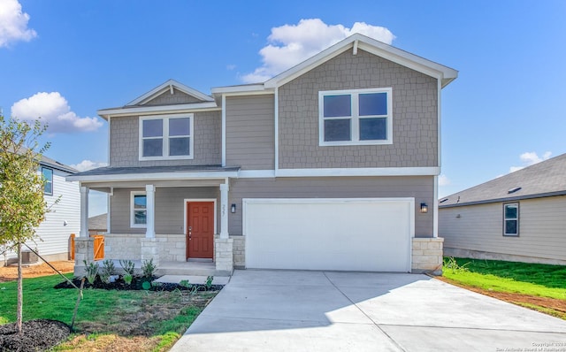 craftsman-style house with covered porch and a garage