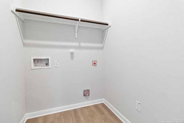 laundry area with washer hookup, gas dryer hookup, electric dryer hookup, and wood-type flooring