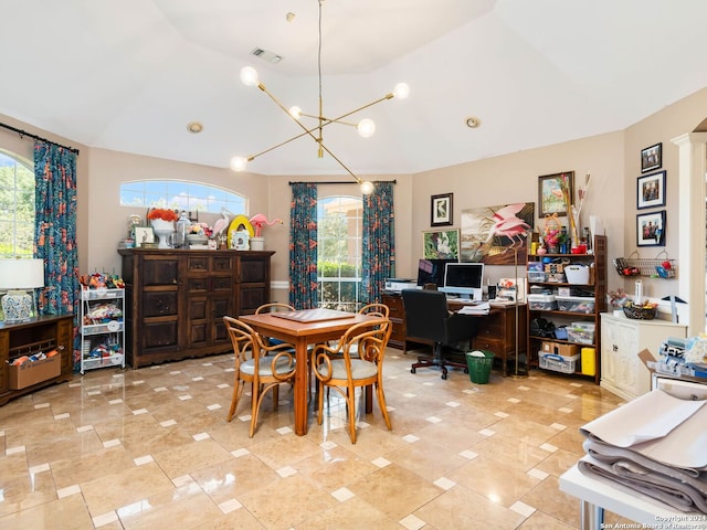 dining room featuring lofted ceiling and a notable chandelier