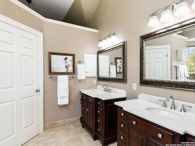 bathroom featuring lofted ceiling and vanity