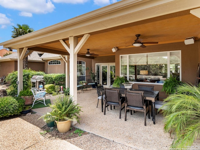 view of patio / terrace with ceiling fan and grilling area