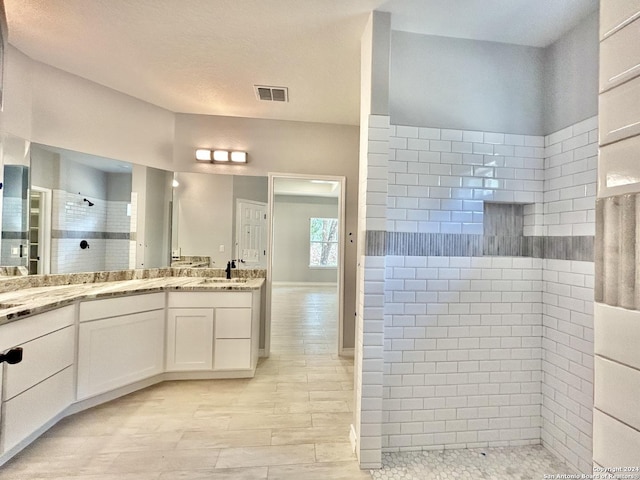 unfurnished room with ceiling fan with notable chandelier