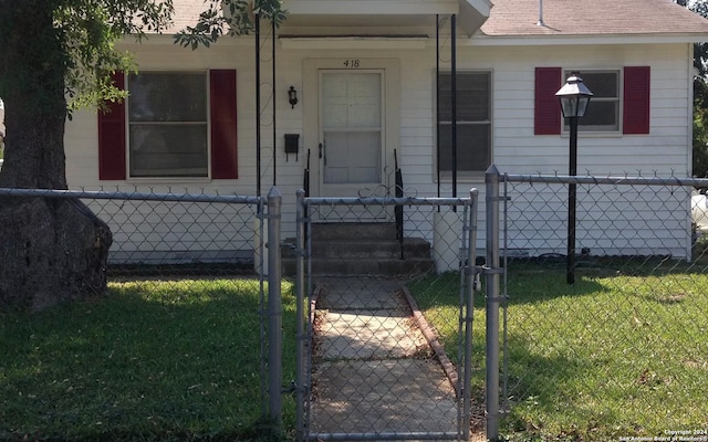 bungalow with a front lawn