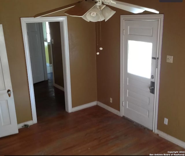 entryway featuring ceiling fan and dark hardwood / wood-style flooring