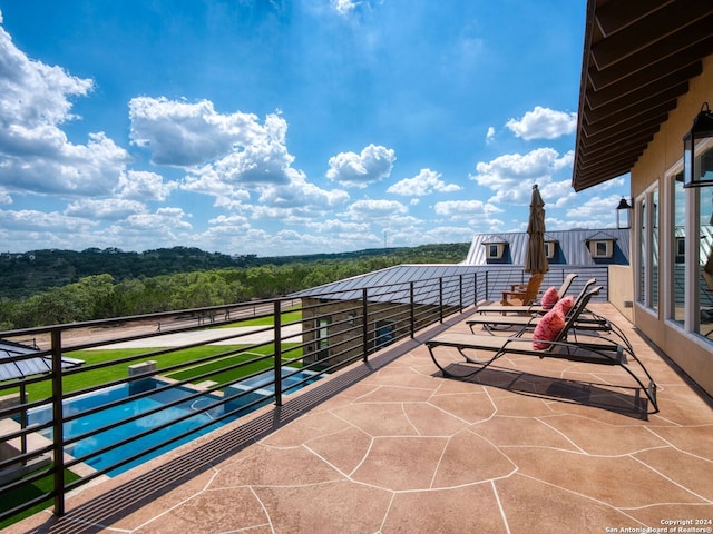 view of patio / terrace featuring a balcony