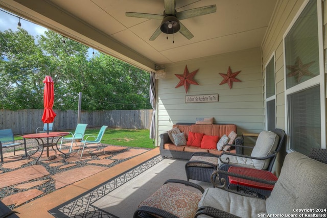 view of patio / terrace featuring outdoor lounge area and ceiling fan