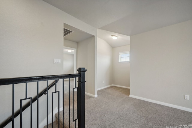 corridor with carpet flooring