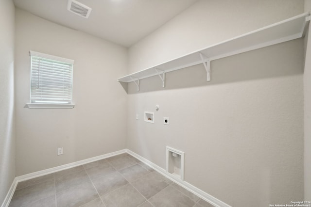 laundry area with washer hookup, gas dryer hookup, and electric dryer hookup