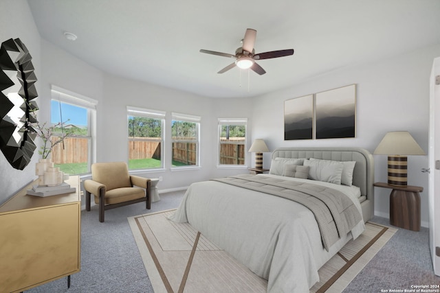 carpeted bedroom featuring ceiling fan