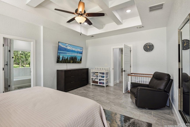 bedroom featuring beam ceiling, connected bathroom, ceiling fan, and coffered ceiling