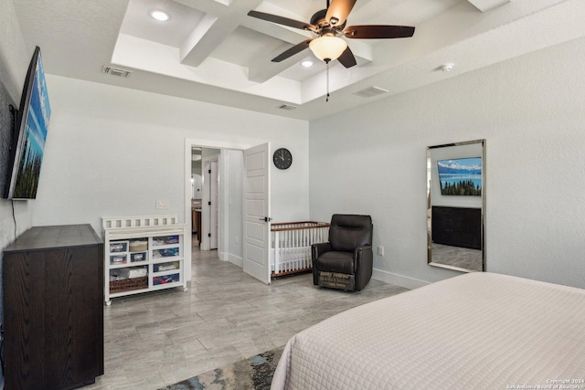 bedroom with beam ceiling, ceiling fan, and coffered ceiling