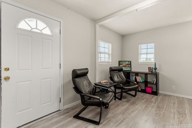 sitting room with light hardwood / wood-style flooring