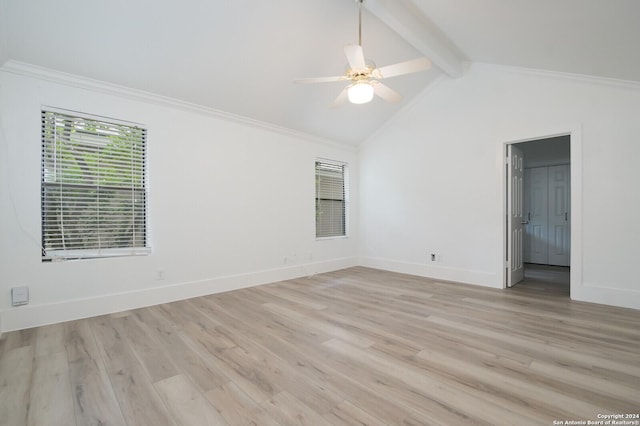 spare room with vaulted ceiling with beams, light hardwood / wood-style floors, ceiling fan, and crown molding