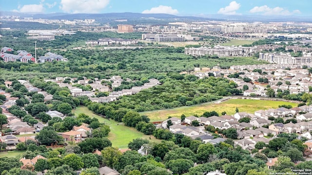 drone / aerial view featuring a mountain view