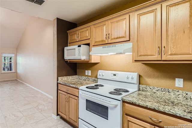 kitchen with vaulted ceiling, light stone countertops, and white appliances