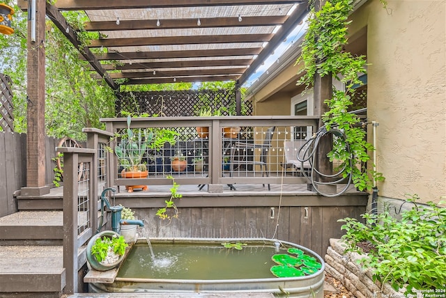 wooden terrace featuring a pergola