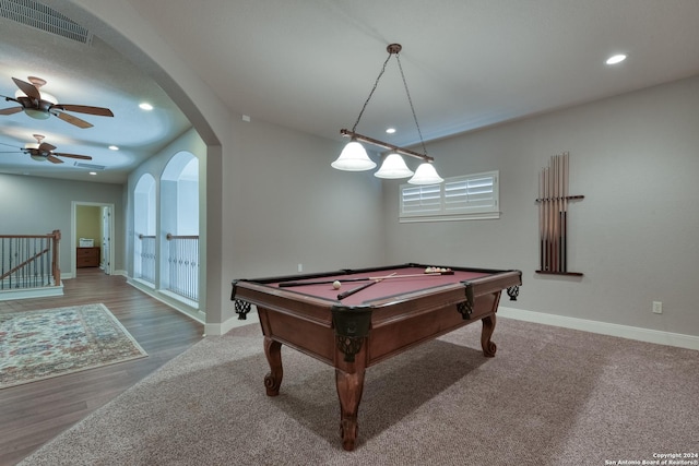 rec room with hardwood / wood-style floors, ceiling fan, and pool table