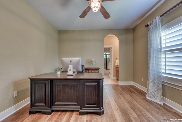 office area with ceiling fan and light wood-type flooring