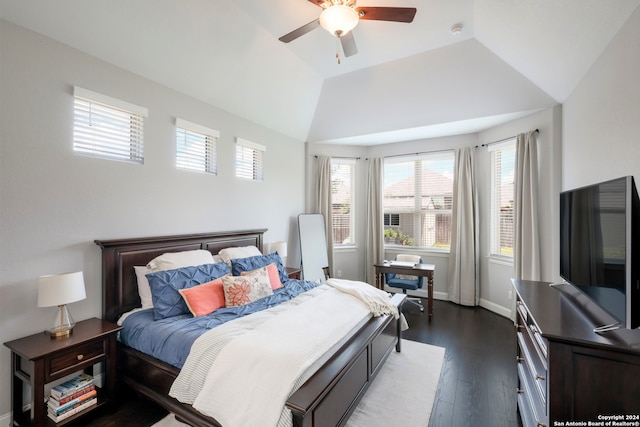 bedroom with dark hardwood / wood-style floors, ceiling fan, and lofted ceiling