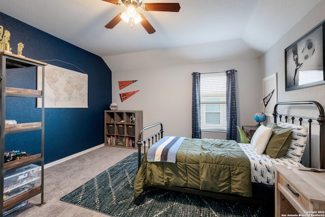 bedroom featuring carpet flooring, ceiling fan, and vaulted ceiling