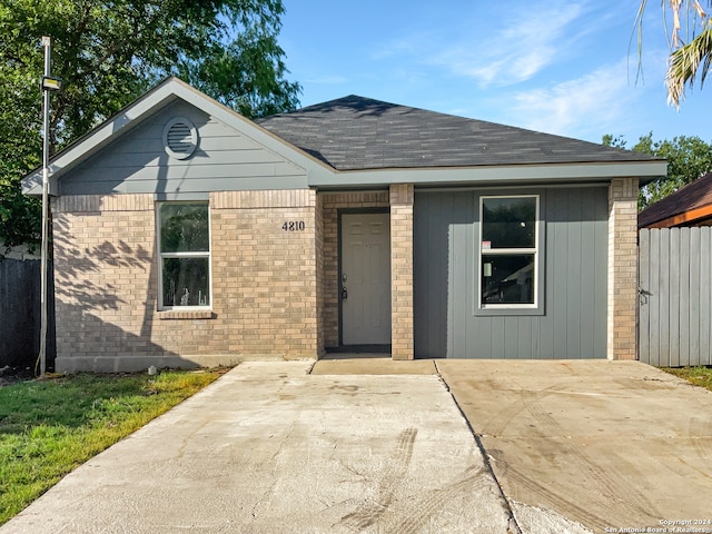 single story home featuring a patio