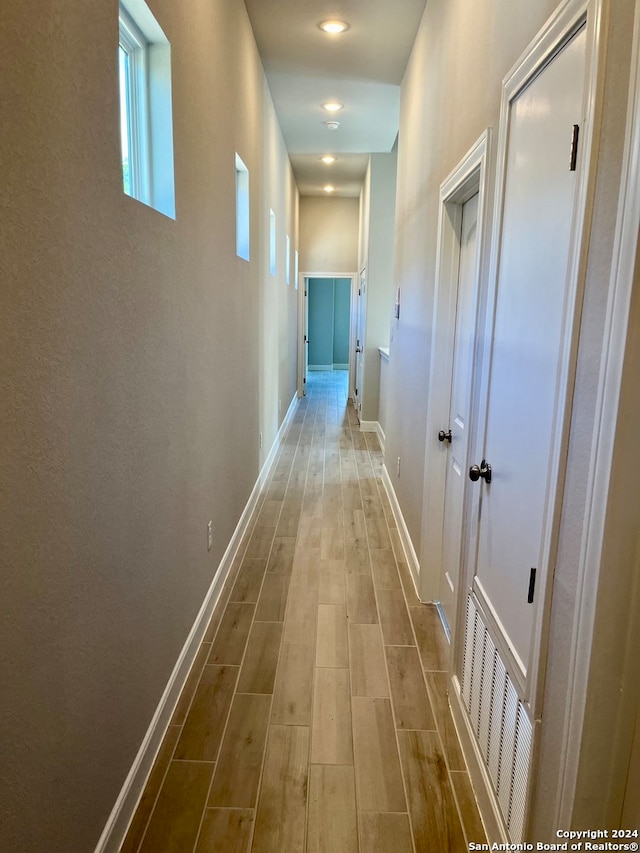 hall featuring hardwood / wood-style floors