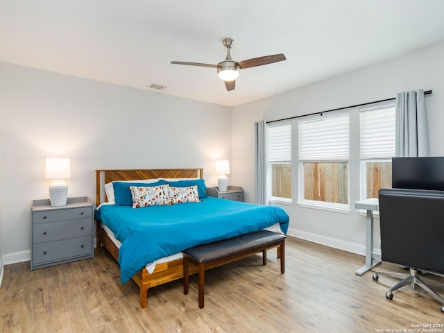 bedroom featuring light wood-type flooring and ceiling fan