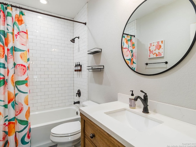 full bathroom featuring shower / bathtub combination with curtain, vanity, and toilet