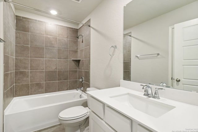 full bathroom featuring bathtub / shower combination, vanity, and toilet