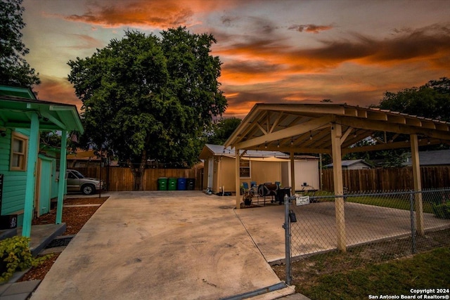 view of patio terrace at dusk