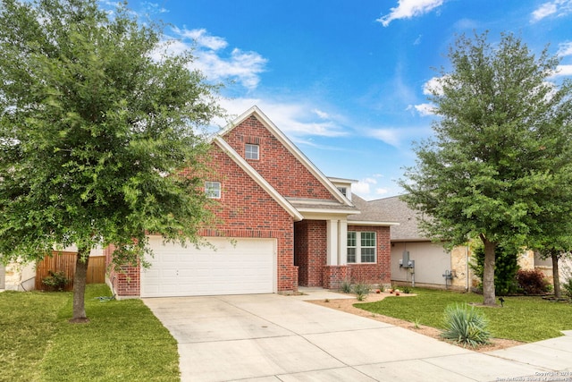 craftsman house with a garage and a front lawn