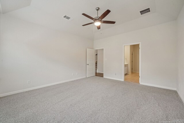 unfurnished room featuring ceiling fan and light colored carpet