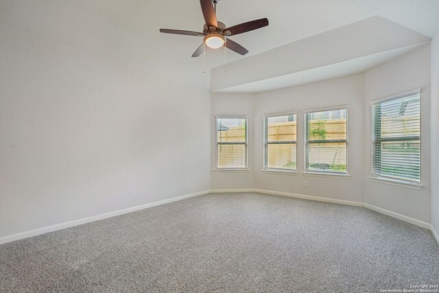 spare room with ceiling fan and carpet floors