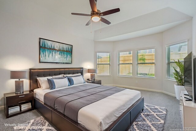 carpeted bedroom featuring ceiling fan