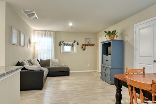 living room featuring light hardwood / wood-style floors