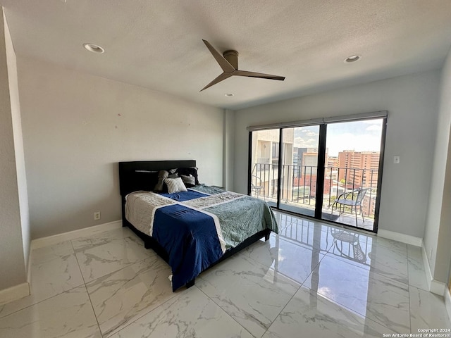 bedroom featuring ceiling fan, a textured ceiling, and access to outside