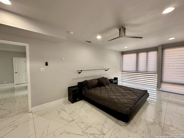 bedroom featuring ceiling fan